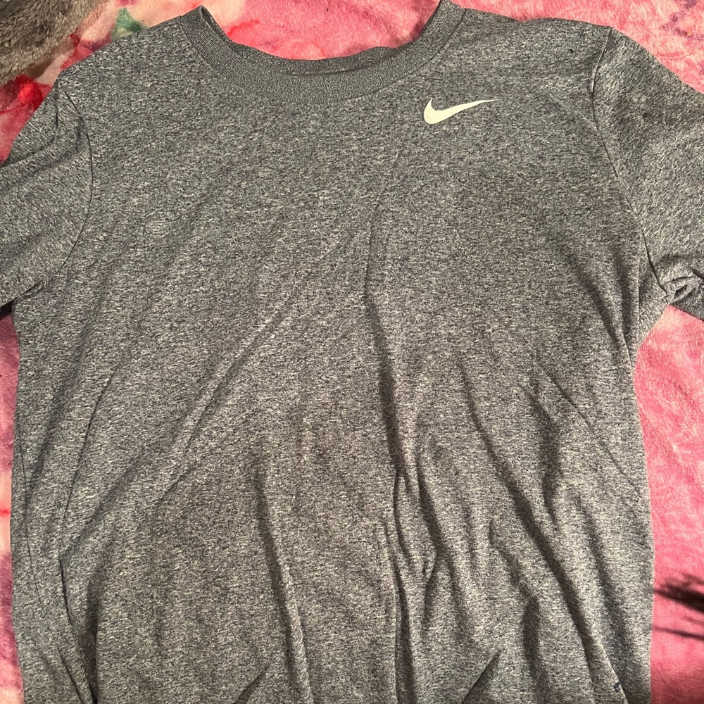 Women’s dri-fit Nike short sleeve shirt.